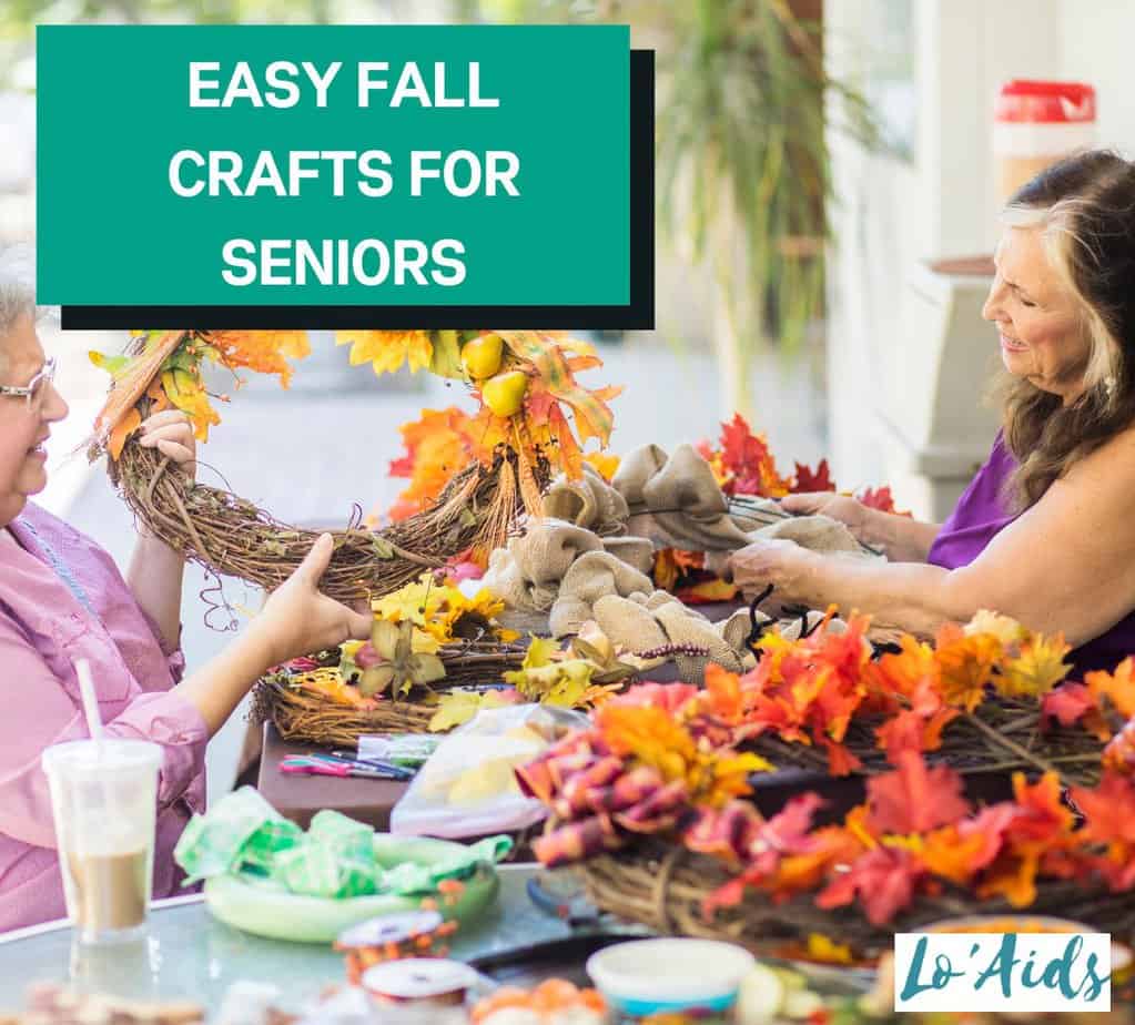 TWO LADY SENIORS DOING FLOWER CRAFTS