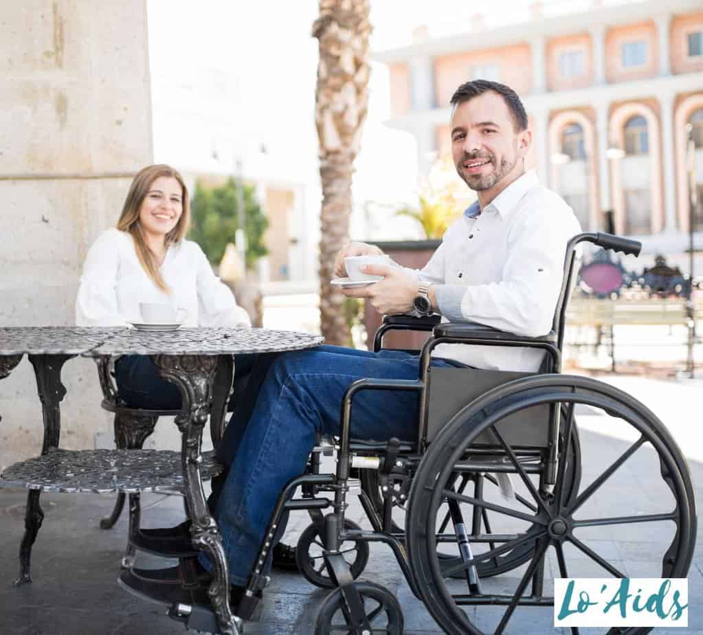 man and woman having coffee in a public place